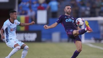 Charlotte FC forward Justin Meram, right, controls the ball in front of Cruz Azul midfielder Uriel Antuna during the first half of a Leagues Cup soccer match Thursday, Aug. 3, 2023, in Frisco, Texas. (AP Photo/LM Otero)