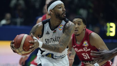 South Sudan guard Carlik Jones (2) against Puerto Rico guard Tremont Waters (51) during their Basketball World Cup group B match at the Araneta Coliseum, Manila, Philippines Saturday, Aug. 26, 2023. (AP Photo/Aaron Favila)