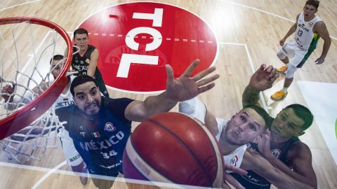 Joshua Ibarra (34) and Fabian Jaimes (3) of Mexico and Tadas Sedekerskis (8) of Lithuania vie for the ball during the FIBA Basketball World Cup Group D game between Lithuania and Mexico at Mall of Asia Arena on Sunday August 27, 2023 in Pasay, Metro Manila, Philippines. (Ezra Acayan/Pool Photo via AP)