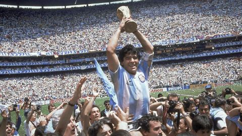FILE - Argentina's Diego Maradona, celebrates at the end of the World Cup soccer final game against West Germany at the Atzeca Stadium, in Mexico City, June 29, 1986. The heirs of the late soccer star Diego Maradona have won a legal battle over the use of his trademark. Maradona had registered his name as a trademark with the European Union Intellectual Property Office in 2008 for a variety of products, clothing, footwear and headgear. The general court of the European Union confirmed Tuesday that it declined to transfer the trademark to Sattvica, an Argentine company belonging to Maradona’s former lawyer. Maradona died in November 2020. (AP Photo/Carlo Fumagalli, File)