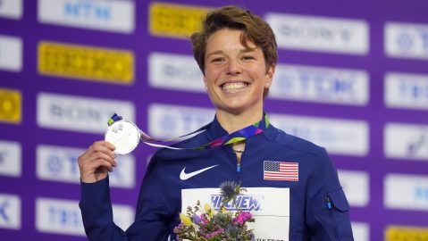 Nikki Hiltz, poses on the podium after winning the silver medal in the women's 1,500 meters final during the World Athletics Indoor Championships at the Emirates Arena in Glasgow, Scotland, Sunday, March 3, 2024. (AP Photo/Petr David Josek)