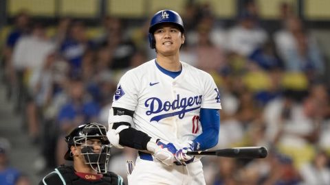 Los Angeles Dodgers designated hitter Shohei Ohtani reacts after a swinging strike during the ninth inning of a baseball game against the Arizona Diamondbacks, Tuesday, July 2, 2024, in Los Angeles. (AP Photo/Ryan Sun)