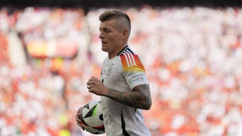 Germany's Toni Kroos runs with the ball to the corner side during the quarter final match between Germany and Spain at the Euro 2024 soccer tournament in Stuttgart, Germany, Friday, July 5, 2024. (AP Photo/Ariel Schalit)