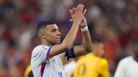 Kylian Mbappe of France applauds fans at the end of a semifinal match between Spain and France at the Euro 2024 soccer tournament in Munich, Germany, Tuesday, July 9, 2024. (AP Photo/Manu Fernandez)