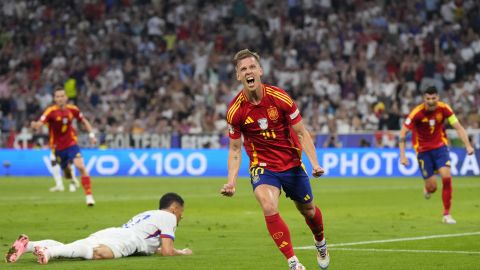 Spain's Dani Olmo celebrates after scoring his side's second goal during a semifinal match between Spain and France at the Euro 2024 soccer tournament in Munich, Germany, Tuesday, July 9, 2024. (AP Photo/Manu Fernandez)