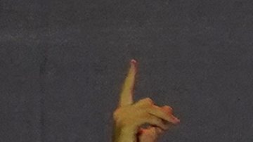 Spain's team captain Alvaro Morata, with the microphone, introduces player Rodri, center, to the fans during celebrations of the Spanish team's European soccer championship title on a stage at Cibeles square in Madrid, Monday, July 15, 2024. Spain defeated England in the final of the Euro 2024 soccer tournament in Berlin on Sunday evening. (AP Photo/Andrea Comas)