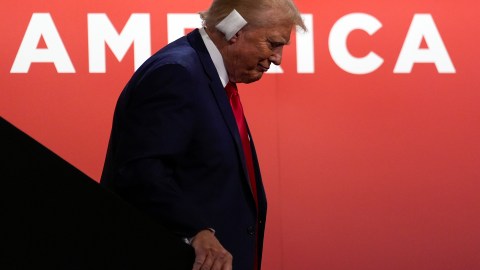 Republican presidential candidate former President Donald Trump walks down stairs as he attends the first day of the Republican National Convention, Monday, July 15, 2024, in Milwaukee. (AP Photo/Carolyn Kaster)