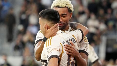 Los Angeles FC forward Cristian Olivera, left, Cele rates with midfielder Timothy Tillman after scoring a goal during the first half of a MLS soccer match against Real Salt Lake Wednesday, July 17, 2024, in Los Angeles. (AP Photo/Mark J. Terrill)