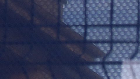 The Eiffel Tower is seen behind a Paris Olympics canvas, from the Trocadero plaza Thursday, July 18, 2024 in Paris. (AP Photo/David Goldman)