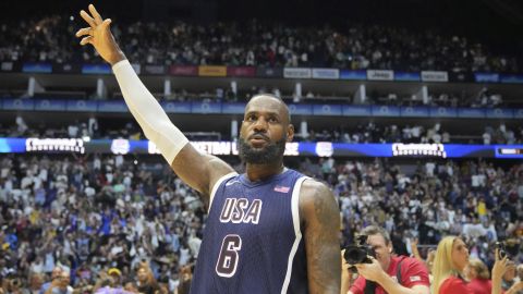 United States' forward LeBron James waves to the crowd after the end of an exhibition basketball game between the United States and South Sudan, at the o2 Arena in London, Saturday, July 20, 2024. (AP Photo/Kin Cheung)