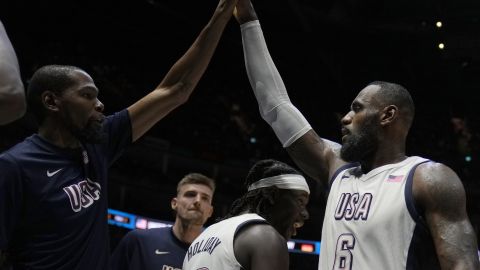 United States' forward LeBron James, right, reacts after an exhibition basketball game between the United States and Germany at the O2 Arena in London, Monday, July 22, 2024. (AP Photo/Alastair Grant)