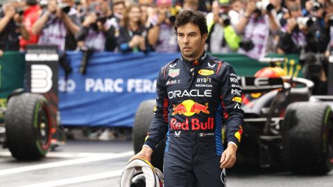 Red Bull driver Sergio Perez of Mexico walks in the pit area after clocking the third fastest time during qualification ahead of the Formula One Grand Prix at the Spa-Francorchamps racetrack in Spa, Belgium, Saturday, July 27, 2024. The Belgian Formula One Grand Prix will take place on Sunday. (AP Photo/Geert Vanden Wijngaert)