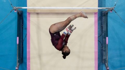 Natalia Escalera, of Mexico, performs on the uneven bars during a women's artistic gymnastics qualification round at the 2024 Summer Olympics, Sunday, July 28, 2024, in Paris, France. (AP Photo/Morry Gash)