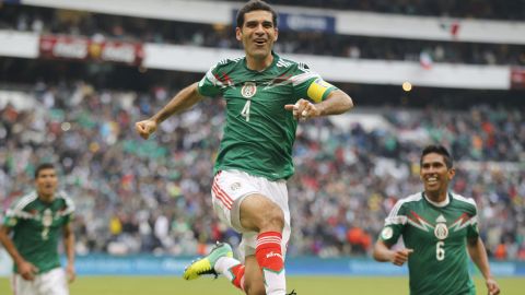 FILE - In this Nov. 13, 2013 file photo, Mexico's Rafael Marquez celebrates after scoring his team's 5th goal during a 2014 World Cup playoff first round match against New Zealand in Mexico City. If nothing unexpected happens, Marquez will be only the second Mexican to appear in four World Cups. (AP Photo/Eduardo Verdugo, File)