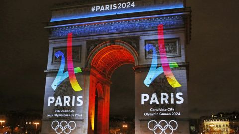 The Eiffel Tower-shaped bid logo for the Paris 2024 is unveiled on The Arc of Triomphe on the Champs Elysees in Paris, France, Tuesday, Feb. 9, 2016. Leaders of the Paris bid for the 2024 Olympics boosted their public campaign on Tuesday as they secured about 8 million euros ($8.9 million) in sponsorship deals with four major French groups. (AP Photo/Francois Mori)