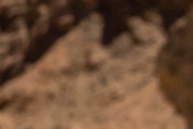 FILE - A hiker passes a sign warning of extreme heat at the start of the Golden Canyon trail, in Death Valley National Park, Calif., July 11, 2023. Parts of California, Nevada and Arizona are expected to bake this week as the first heat wave of the season arrives with triple-digit temperatures forecast for areas including Phoenix, which last summer saw a record 31 straight days of at least 110 degrees Fahrenheit (43.3 Celsius). (AP Photo/Ty ONeil, File)