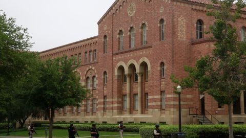 SWAT officers search the UCLA campus near the scene of a fatal shooting at the University of California, Los Angeles, Wednesday, June 1, 2016, in Los Angeles. (AP Photo/Damian Dovarganes)