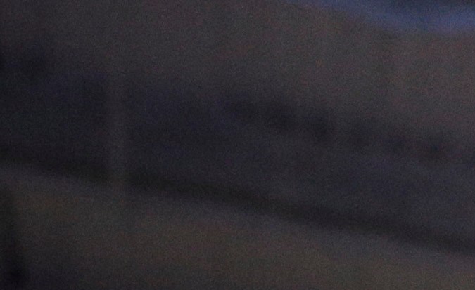 Elon Musk, CEO and CTO of SpaceX, listens to a question from the media in front of the SpaceX Dragon V2 spaceship at the headquarters on Thursday, May 29, 2014, in Hawthorne, Calif. SpaceX, which has flown unmanned cargo capsules to the International Space Station, unveiled the new spacecraft Thursday designed to ferry astronauts to low-Earth orbit. (AP Photo/Jae C. Hong)