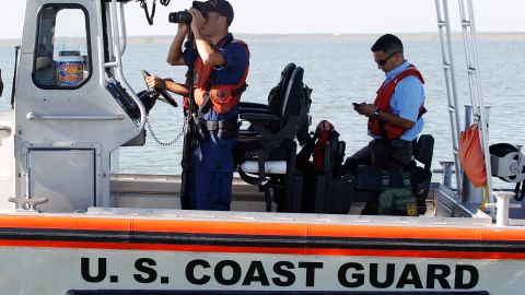 U.S. Coast Guard patrols on Falcon Lake, a lake that straddles the U.S. Mexico border, where where Coloradan David Hartley is still missing, Thursday, Oct. 7, 2010 in Zapata, Texas. Hartley's wife says her husband was shot to death by Mexican pirates chasing them on speedboats across the lake on Sept. 30 as they returned on Jet Skis from a trip to photograph a historic Mexican church. (AP Photo/Eric Gay)