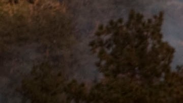 FILE - This Oct. 4, 2009 file photo shows Daniel Fawcett of the U.S. Forest Service setting a back-fire to combat a wildfire in Wrightwood, Calif. Since the 1997 international accord to fight global warming, climate change has worsened and accelerated, beyond some of the grimmest warnings. Officials from across the world will convene in Copenhagen next month to seek a follow-up pact, one that President Barack Obama says "has immediate operational effect...an important step forward in the effort to rally the world around a solution." (AP Photo/Francis Specker, File)