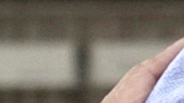 Myanmar's pro-democracy opposition leader Aung San Suu Kyi, right, and U.S. Secretary of State Hillary Rodham Clinton embrace after a meeting at Suu Kyi's residence in Yangon, Myanmar, Friday, Dec. 2, 2011. U.S. Secretary of State Clinton and opposition leader Suu Kyi, two of the world's most recognizable female leaders, pledged Friday to work together to bring democracy to Suu Kyi's long isolated and repressive nation. (AP Photo/Saul Loeb, Pool)