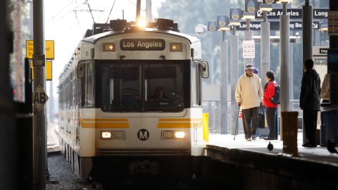 In this photo taken on on Thursday, Dec. 23, 2010, a Blue Line light rail train is seen in Los Angeles. Responding to accidents on the track has become a regular part of patrolling the 22-mile Blue Line. In just 20 years of operation, it has been linked to 101 fatalities, 23 of them resulting from suicides and the rest from trains clashing with pedestrians and motorists as they pass through some of the densest and poorest neighborhoods of South Los Angeles. (AP Photo/Damian Dovarganes)