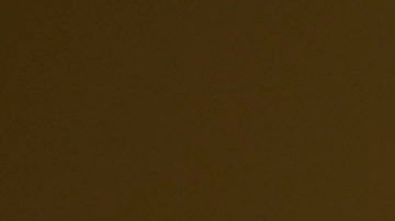 FILE - People walk along a trail as the sun sets, July 16, 2023, in Death Valley National Park, Calif. Across the U.S., many people are living through one of the most brutal summers of their lives and reckoning with the idea that climate change is only going to make matters worse in the coming decades. (AP Photo/John Locher, File)