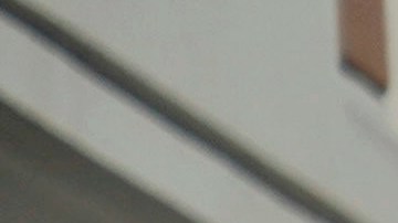 An EMT disinfects a gurney after transporting a patient at St. Joseph Hospital in Orange, Calif., Thursday, Jan. 7, 2021. California health authorities reported Thursday a record two-day total of 1,042 coronavirus deaths as many hospitals strain under unprecedented caseloads (AP Photo/Jae C. Hong)