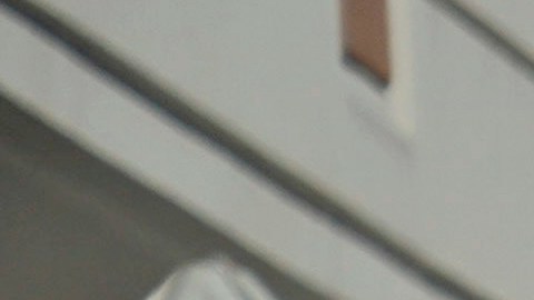 An EMT disinfects a gurney after transporting a patient at St. Joseph Hospital in Orange, Calif., Thursday, Jan. 7, 2021. California health authorities reported Thursday a record two-day total of 1,042 coronavirus deaths as many hospitals strain under unprecedented caseloads (AP Photo/Jae C. Hong)