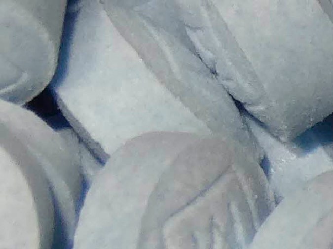 FILE - This undated file photo provided by the U.S. Attorneys Office for Utah and introduced as evidence at a trial shows fentanyl-laced fake oxycodone pills collected during an investigation. Accidental overdoses contribute to 90 percent of all U.S. opioid-related deaths. Rising use of illicitly manufactured and highly potent synthetic opioids including fentanyl has likely contributed to the unintentional death rate, which surged nine-fold between 2000 and 2017, the study found. (U.S. Attorneys Office for Utah via AP, File)