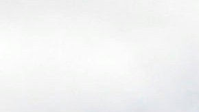 Motorists drive by SpaceX headquarters in Hawthorne, Calif., Friday, May 25, 2012. The privately bankrolled Dragon capsule made a historic arrival at the International Space Station on Friday, triumphantly captured by astronauts wielding a giant robot arm. SpaceX is the first private company to accomplish such a feat: a commercial cargo delivery into the cosmos. (AP Photo/Jae C. Hong)