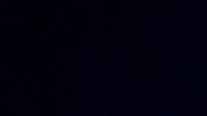 A law enforcement official removes police tape at a house Tuesday, Jan. 6, 2015, on Ridge Road near Douglasville, Ga., where a shooting took place. Cpl. Sam Driskell was found fatally shot along with his wife, daughter and stepson, sheriff's spokesman Ashley Henson said. (AP Photo/Kevin Liles)