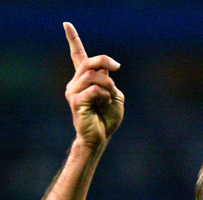 Cruz Azul player Cesar Delgado celebrate with fans at the end of gis game against Chivas during their Mexican Soccer League match celebrated at the Jalisco Stadium Saturday, Feb. 19 2005, in Guadalajara City, Mexico. Cruz Azul and Chivas tied 1-1, and Cruz Azul is the only team on the tournament without a loss. (AP Photo/Guillermo Arias) **EFE OUT**