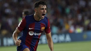 Barcelona's Pedri celebrates after scoring his side's opening goal during a Spanish La Liga soccer match between Barcelona and Cadiz at the Camp Nou stadium in Barcelona, Spain, Sunday, Aug. 20, 2023. (AP Photo/Joan Monfort)