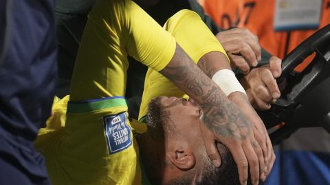 Brazil's Neymar is carried off the pitch on a stretcher after being injured during a qualifying soccer match for the FIFA World Cup 2026 against Uruguay at Centenario stadium in Montevideo, Uruguay, Tuesday, Oct. 17, 2023. (AP Photo/Matilde Campodonico)