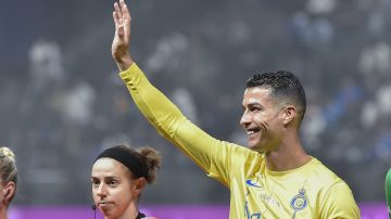 Al Nassr's Cristiano Ronaldo greets his fans during Riyadh Season Cup 2024 final match at Kingdom Arena Stadium in Riyadh, Saudi Arabia, Thursday, Feb. 8, 2024. (AP Photo)