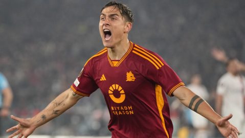 Roma's Paulo Dybala celebrates after scoring his team's secnd goal during the Europa League quarterfinal second leg soccer match between Roma and AC Milan, at Rome's Olympic Stadium, Thursday, April 18, 2024. (AP Photo/Andrew Medichini)