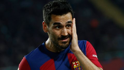 Barcelona's Ilkay Gundogan touches his face during a Spanish La Liga soccer match between Barcelona and Real Sociedad at the Olimpic Lluis Companys stadium in Barcelona, Spain, Monday, May 13, 2024. (AP Photo/Joan Monfort)