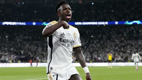 Real Madrid's Vinicius Junior celebrates after scoring his side's second goal during the Champions League final soccer match between Borussia Dortmund and Real Madrid at Wembley stadium in London, Sunday, June 2, 2024. (AP Photo/Frank Augstein)