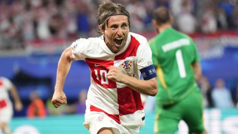 Croatia's Luka Modric celebrates after scoring his side's opening goal during a Group B match between Croatia and Italy at the Euro 2024 soccer tournament in Leipzig, Germany, Monday, June 24, 2024. (AP Photo/Ebrahim Noroozi)