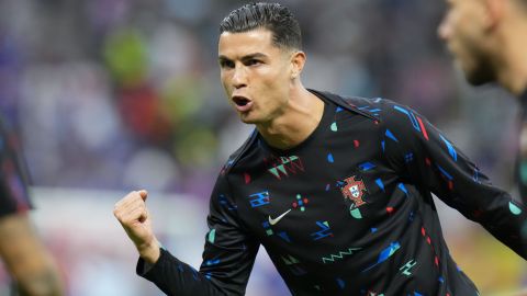 Portugal's Cristiano Ronaldo gestures as he warms up on the pitch before a quarter final match against France at the Euro 2024 soccer tournament in Hamburg, Germany, Friday, July 5, 2024. (AP Photo/Hassan Ammar)