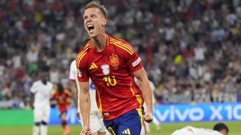 Spain's Dani Olmo celebrates after scoring his side's second goal during a semifinal match between Spain and France at the Euro 2024 soccer tournament in Munich, Germany, Tuesday, July 9, 2024. (AP Photo/Manu Fernandez)