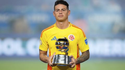 Colombia's James Rodriguez holds the player of the tournament trophy after the Copa America final soccer match in Miami Gardens, Fla., Monday, July 15, 2024. Argentina defeated Colombia 1-0. (AP Photo/Julio Cortez)