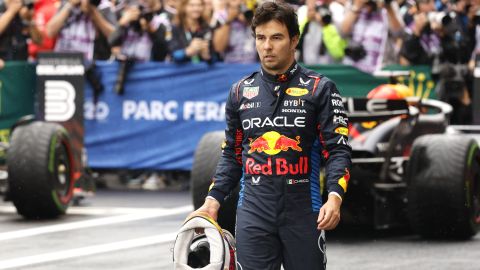 Red Bull driver Sergio Perez of Mexico walks in the pit area after clocking the third fastest time during qualification ahead of the Formula One Grand Prix at the Spa-Francorchamps racetrack in Spa, Belgium, Saturday, July 27, 2024. The Belgian Formula One Grand Prix will take place on Sunday. (AP Photo/Geert Vanden Wijngaert)