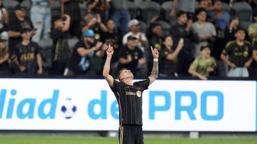 Los Angeles FC midfielder Mateusz Bogusz reacts after scoring his side's game-tying goal during the second half of a Leagues Cup soccer match against the Vancouver Whitecaps, Tuesday, July 30, 2024, in Los Angeles. (AP Photo/Ryan Sun)