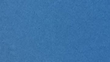 Osmar Olvera muestra su medalla y la bandera de México.