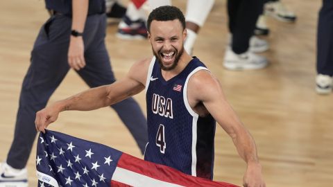 United States' Stephen Curry (4) reacts after winning a men's gold medal basketball game at Bercy Arena at the 2024 Summer Olympics, Saturday, Aug. 10, 2024, in Paris, France. (AP Photo/Michael Conroy)