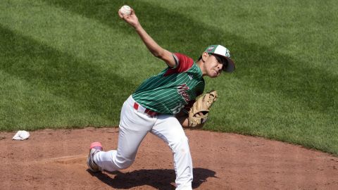 Mexico's pitcher Raul Hernandez Jr. delivers a pitch against Aruba during the sixth inning of a baseball game at the Little League World Series tournament in South Williamsport, Pa., Wednesday, Aug. 14, 2024. (AP Photo/Tom E. Puskar)