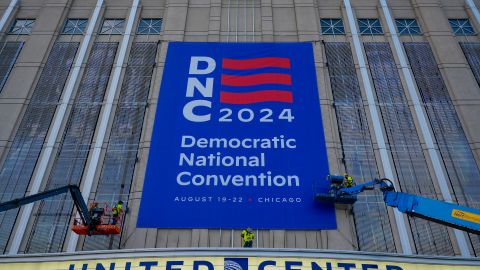 Signage is hung on the exterior of the United Center in preparation for next week's Democratic National Convention in Chicago on Wednesday, Aug. 14, 2024.(AP Photo/Pablo Martinez Monsivais)