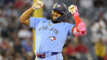 Toronto Blue Jays' Vladimir Guerrero Jr. gestures on second after a double in the fifth inning of a baseball game against the Los Angeles Angels Wednesday, Aug. 14, 2024, in Anaheim, Calif. (AP Photo/Jayne-Kamin-Oncea)